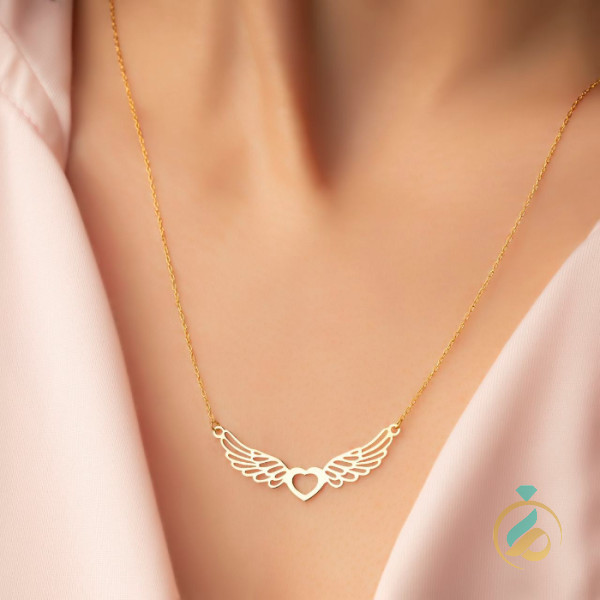 گردنبند طلا قلب بالدار.