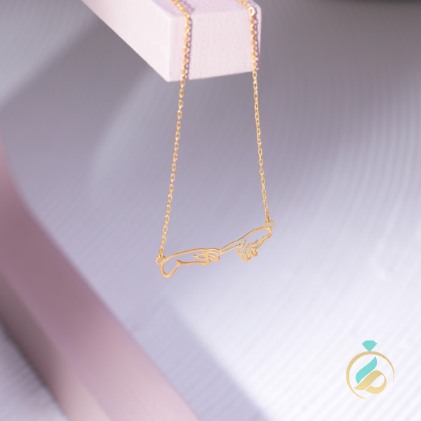گردنبند طلا دست در دست
